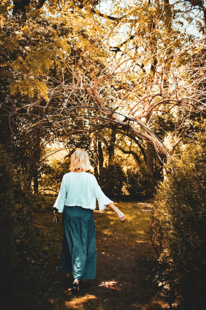 Middle-aged person walking outdoors